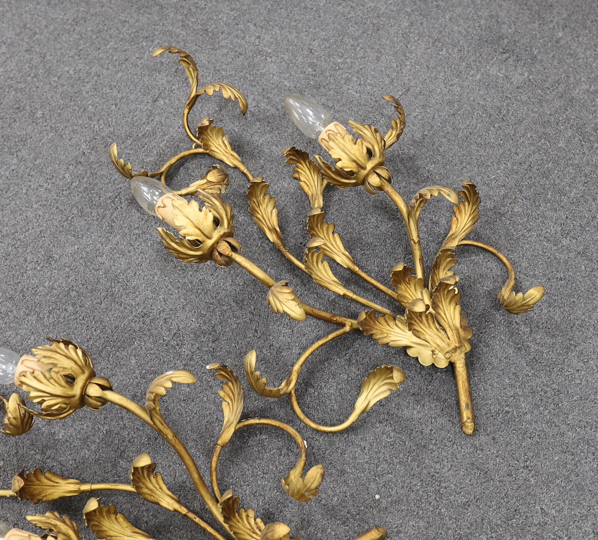 A pair two-light gilt twin branch wall sconces, 56cm high